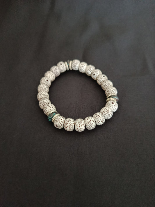 Bracelet fantaisie blanc tacheté